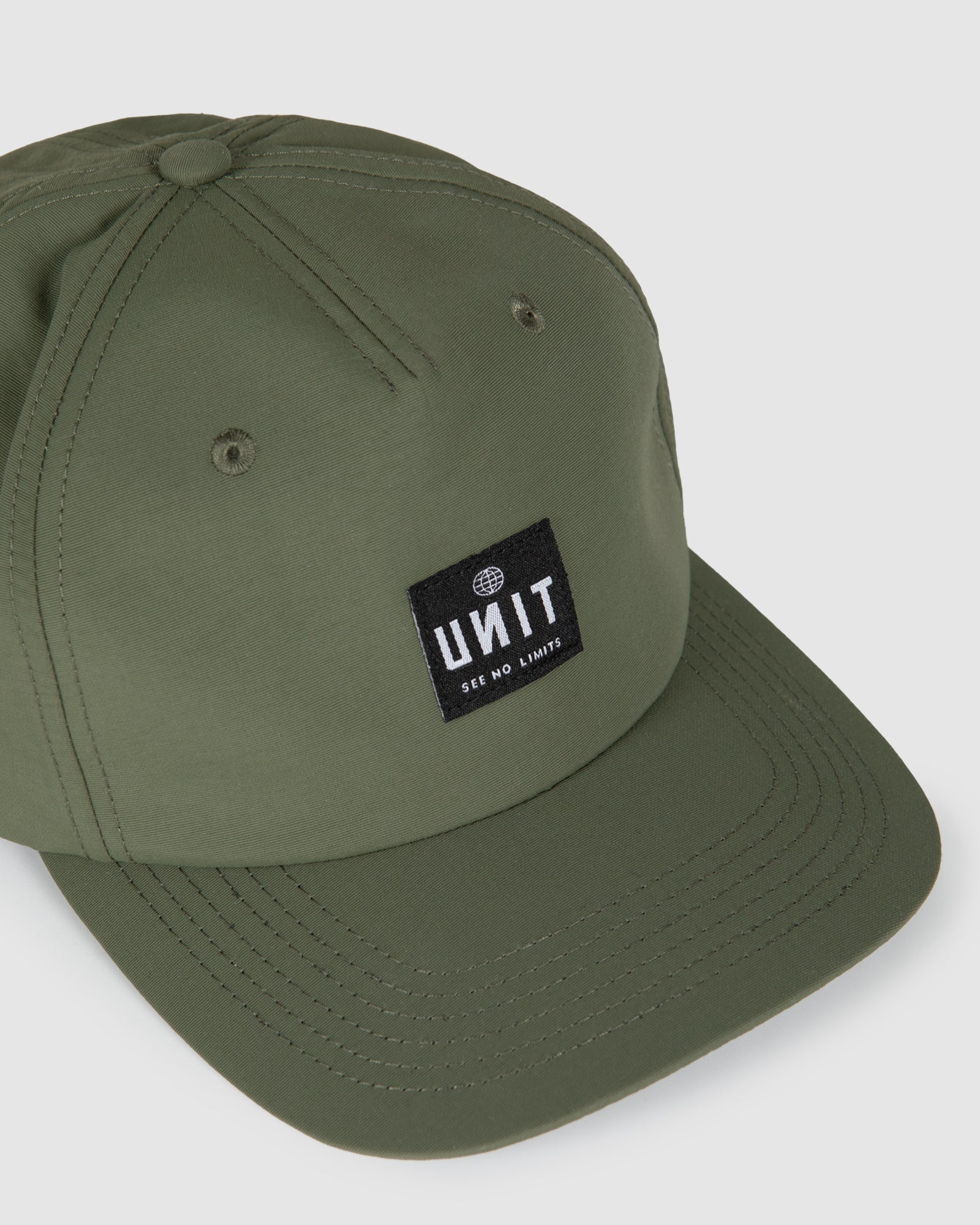 Unit MENS HEADWEAR - FLAT PEAK UNSTRUCTURED STRAPBACK - LEVEL